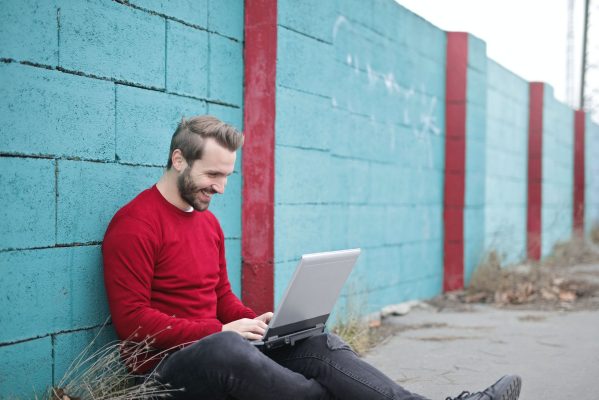best personal online loan man on laptop