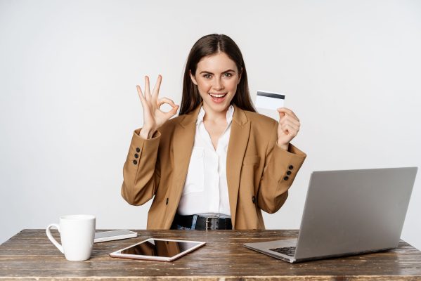 improve your credit score image of woman with credit card