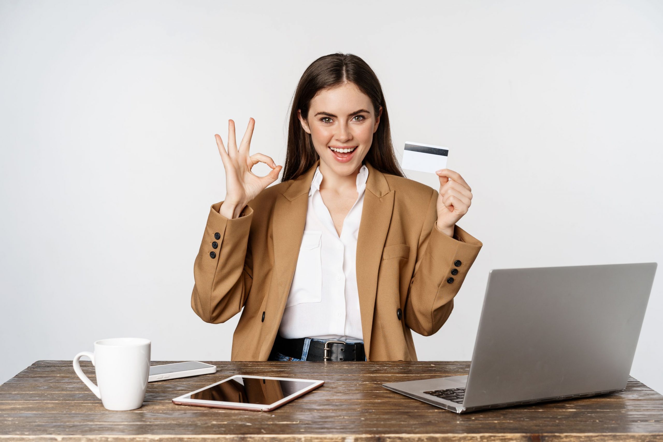 improve your credit score image of woman with credit card