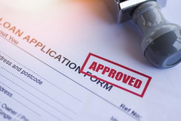 loan applications image of application form approved stamp