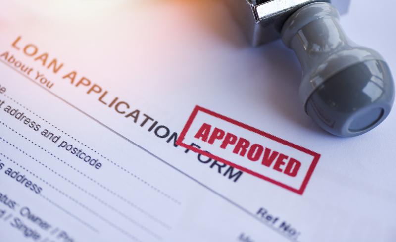 loan applications image of application form approved stamp