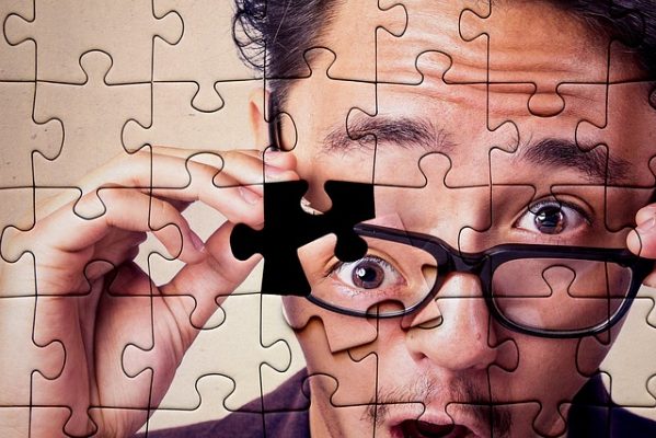 personal loan image of man with last puzzle piece