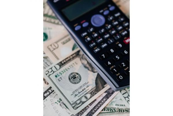 financial goals image of calculator and money