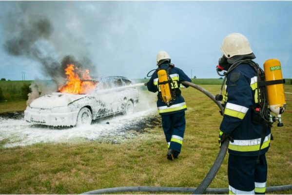 emergency loans image of firemen putting out car fire