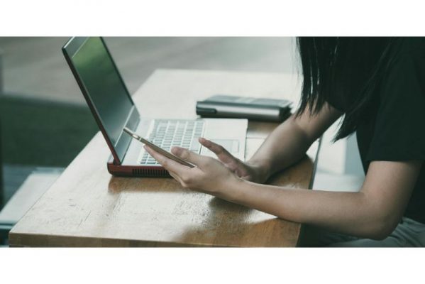 online loans image of woman with laptop and cellphone