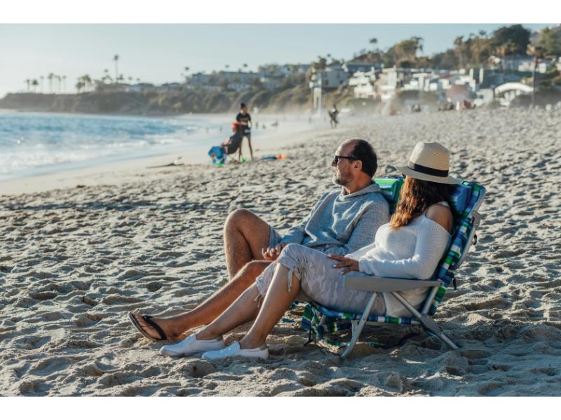 borrow for summer expenses image of couple on beach