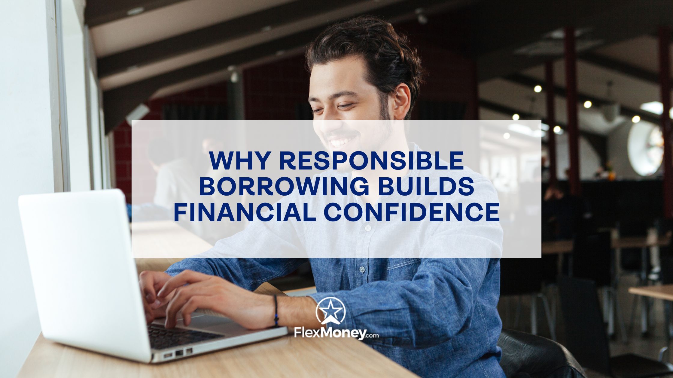 Man smiling while using a laptop, representing how responsible borrowing builds financial confidence for FlexMoney.