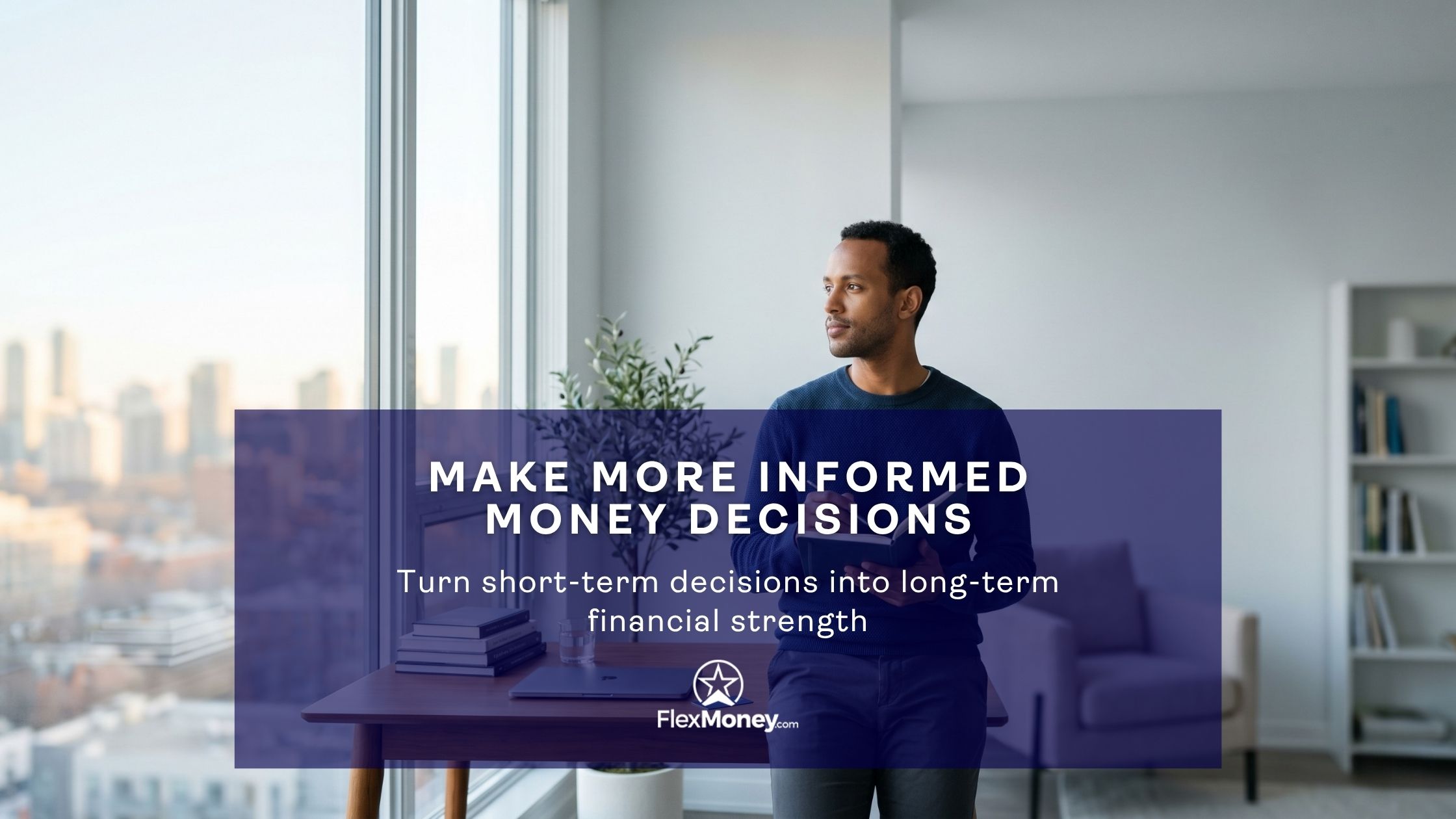Man standing by a window holding a tablet and looking outside, symbolizing making informed financial decisions and building long term financial strength